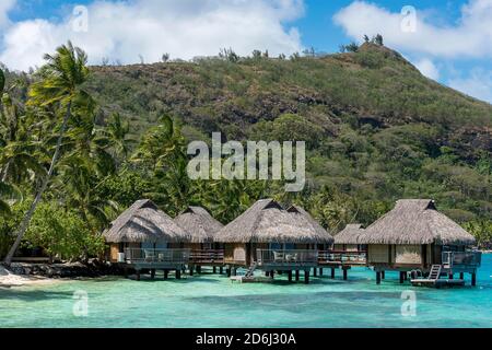 Overwater bungalows in the lagoon, Maitai hotel complex, Bora Bora, French Polynesia, Oceania Stock Photo