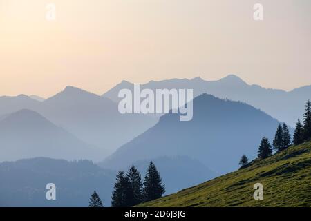 Mountains in haze, at Sudelfeld, near Bayrischzell, Mangfall mountains, Upper Bavaria, Bavaria, Germany Stock Photo