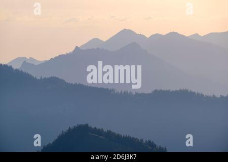 Mountains in haze, at Sudelfeld, near Bayrischzell, Mangfall mountains, Upper Bavaria, Bavaria, Germany Stock Photo