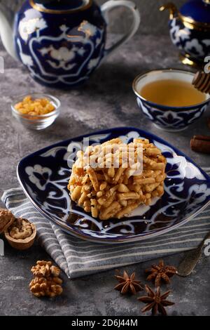 Traditional azian cake chuk chuk with honey and nuts Stock Photo