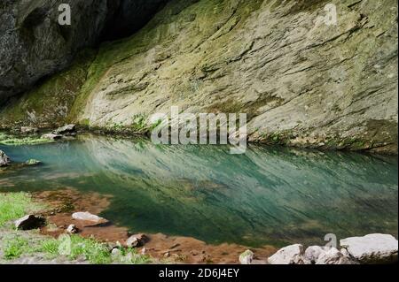 Winding river in taiga forest plane view before landing in Magadan, Far East Russia. Stock Photo