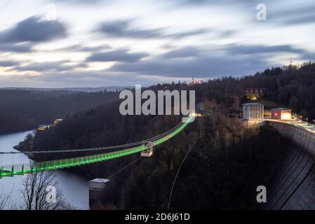 Illuminated suspension bridge Titan RT at the Rappbodetalsperre, Harz, Wendefurth, Saxony-Anhalt, Germany Stock Photo