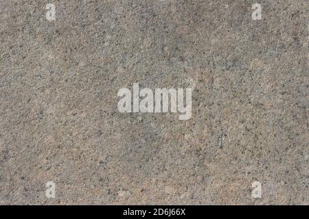The texture of a natural stone slab from polished granite. Stock Photo