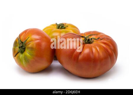 Fresh tomatoes isolated on white background Stock Photo
