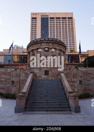 A view leading up the staircase to the eternal flame in Brisbane's Anzac Square. Anzac Square commemorates the fallen from all of Australia's wars. Stock Photo