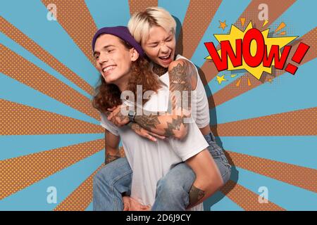 Young adult couple having fun together and smiling wide Stock Photo