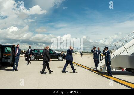 Miami, United States Of America. 16th Oct, 2020. President Donald J. Trump salutes United States Air Force personnel as he prepares to board Air Force One at Miami International Airport in Miami Friday, Oct. 16, 2020, en route to Southwest Florida International Airport in Fort Myers, Fla People: President Donald Trump Credit: Storms Media Group/Alamy Live News Stock Photo