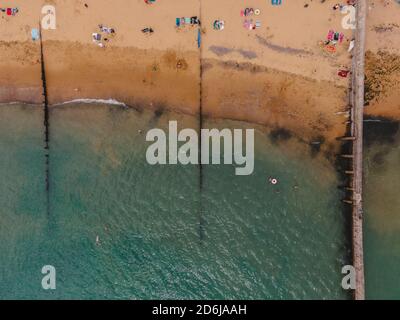 Viking Bay, Kent / UK -  2020.08.01: Drone Aerial shot of Beautiful sand beach in East England packed with people during Coronavirus Pandemic Stock Photo