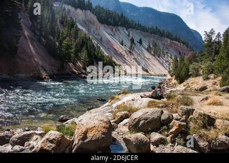 Relaxing on the Yellowstone River, Yellowstone National Park, Wyoming, USA Stock Photo