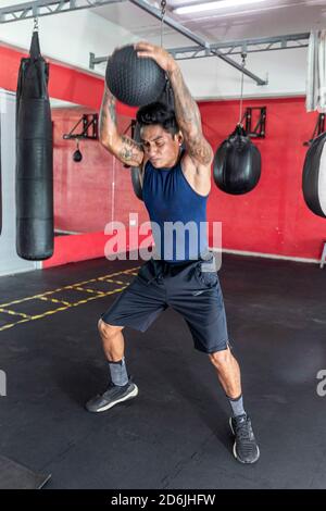 CANCUN, MEXICO - OCTOBER 16: boxer Alexis Bastar taking health measures while train in the Gym  to get ready for his next fight from the super bantamweight category against Pollo Lopez on October 16, 2020 in Cancun, Mexico. Credit: Rodolfo Flores/Eyepix Group/The Photo Access Stock Photo