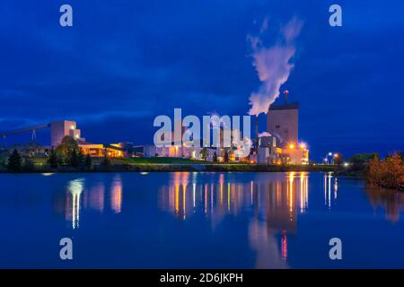 The Domtar pulp and paper mill illuminated at night in Dryden, Ontario, Canada. Stock Photo