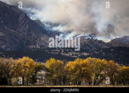 Niwot, United States. 17th Oct, 2020. Smoke rises from the CalWood wildfire which is burning in the Boulder County foothills near the town of Jamestown, as seen from Niwot, Colorado on Saturday, October 17, 2020. Officials have declared a wide evacuation zone encompassing land west of the Peak to Peak Highway to across U.S. 36 on the east side, and from Jamestown on the south end, north to South Sheep Mountain. Photo by Bob Strong/UPI Credit: UPI/Alamy Live News Stock Photo