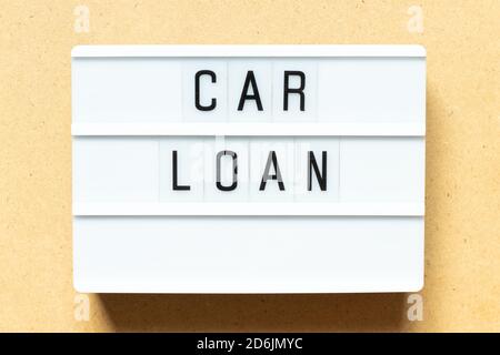 Lightbox with word car loan on wood background Stock Photo