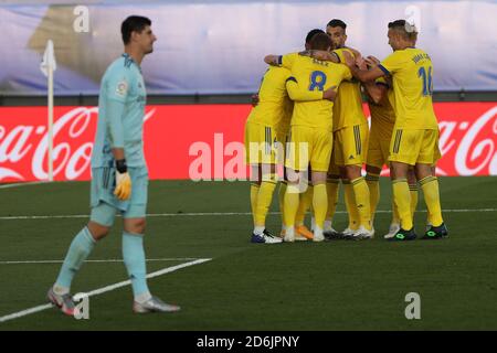 Madrid, Spain. 17th Oct, 2020. Cadiz's players celebrate scoring during a Spanish football league match between Real Madrid and Cadiz CF in Madrid, Spain, on Oct. 17, 2020. Credit: Edward F. Peters/Xinhua/Alamy Live News Stock Photo