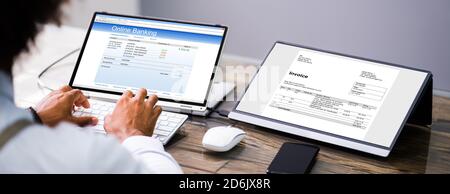 Electronic Invoice Bill Online. Tax Manager At Desk Stock Photo