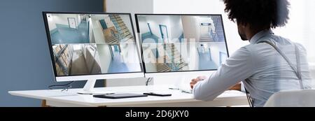 CCTV Security Footage On Multiple Computer Monitors Stock Photo