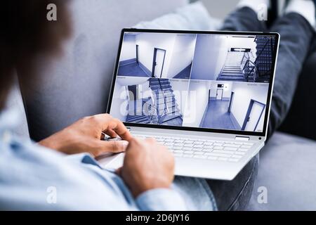 CCTV Security Camera Surveillance Footage On Laptop Stock Photo