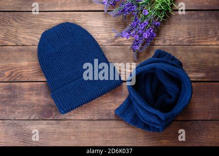 Beautiful woolen knitted things hat and snood. Christmas gifts Stock Photo