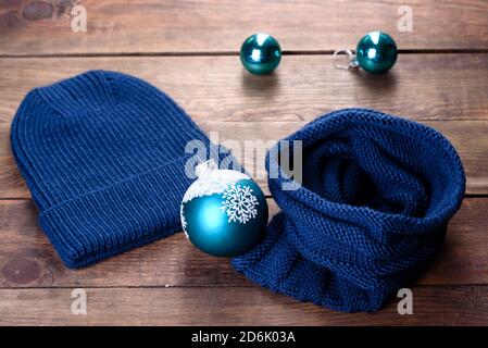 Beautiful woolen knitted things hat and snood. Christmas gifts Stock Photo