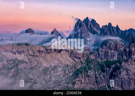 The mountain group Cadini di Misurina at sunset, seen from the mountain hut Auronzo, Rifugio Auronzo, at sunset. Stock Photo