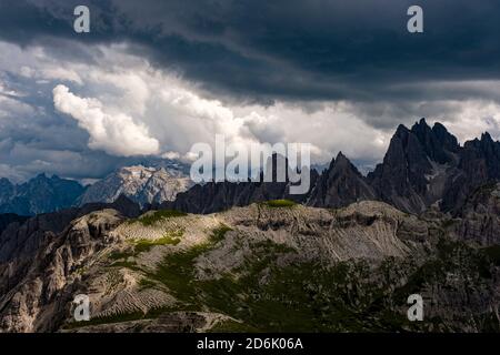 The mountain group Cadini di Misurina, seen from the mountain hut Auronzo, Rifugio Auronzo, dark thunderstorm clouds moving in. Stock Photo