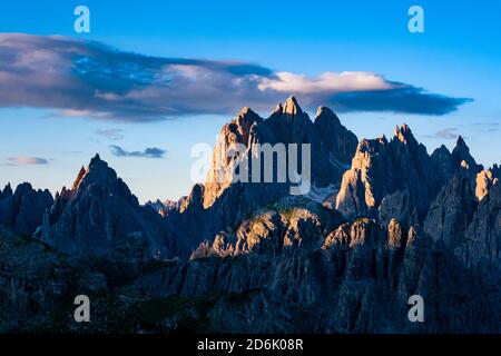 The mountain group Cadini di Misurina, seen from the mountain hut Auronzo, Rifugio Auronzo, at sunrise. Stock Photo