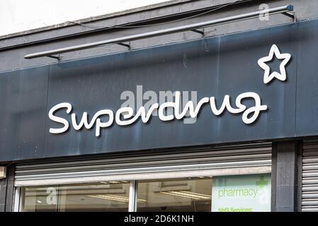 Derry, Northern Ireland- Sept 27, 2020: The sign for Superdrug in Derry. Stock Photo