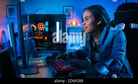 Happy Pretty Blonde Gamer Girl Playing Online Video Game on Her Personal  Computer Stock Photo - Alamy