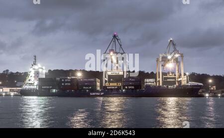 Tivoli, Cork, Ireland. 18th October, 2020. Container ship Samskip Endeavour offloading her cargo durning the night at Tivoli Docks in Cork City, Ireland. - Credit; David Creedon / Alamy Live News Stock Photo