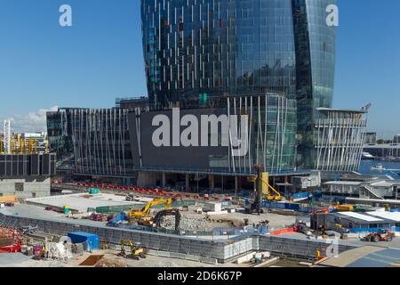 Construction of the new suburb of Barangaroo in Sydney, Australia, seen on Hickson Road from an elevated vantage point on High Street in Millers Point near The Rocks. Barangaroo is named after the indigenous wife of Australian Aboriginal artist, Bennelong. When completed, Barangaroo will contain retail outlets, 5-star hotels, a casino and highrise apartments. Stock Photo