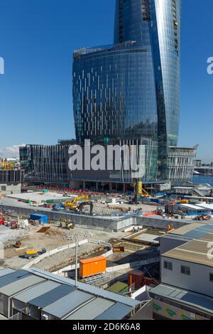 Construction of the new suburb of Barangaroo in Sydney, Australia, seen on Hickson Road from an elevated vantage point on High Street in Millers Point near The Rocks. Barangaroo is named after the indigenous wife of Australian Aboriginal artist, Bennelong. When completed, Barangaroo will contain retail outlets, 5-star hotels, a casino and highrise apartments. Stock Photo