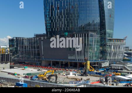 Construction of the new suburb of Barangaroo in Sydney, Australia, seen on Hickson Road from an elevated vantage point on High Street in Millers Point near The Rocks. Barangaroo is named after the indigenous wife of Australian Aboriginal artist, Bennelong. When completed, Barangaroo will contain retail outlets, 5-star hotels, a casino and highrise apartments. Stock Photo