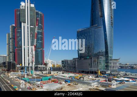 Construction of the new suburb of Barangaroo in Sydney, Australia, seen on Hickson Road from an elevated vantage point on High Street in Millers Point near The Rocks. Barangaroo is named after the indigenous wife of Australian Aboriginal artist, Bennelong. When completed, Barangaroo will contain retail outlets, 5-star hotels, a casino and highrise apartments. Stock Photo