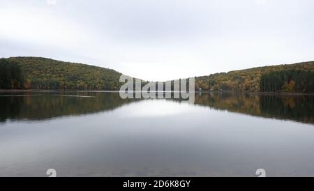 Cooper Lake, the largest natural lake in the Catskill Mountains, is the drinking water reservoir for the city of Kingston, NY Stock Photo