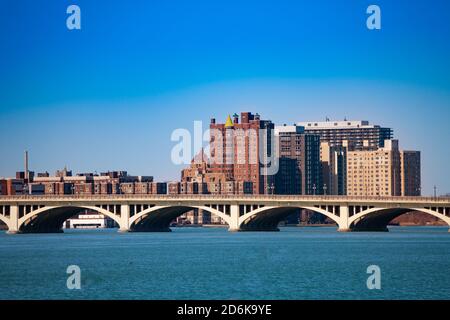 MacArthur bridge over Detroit river on sunny day from sunset point of Belle Isle Stock Photo