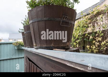 Large backyard wooden garden waste composting bin Stock Photo - Alamy