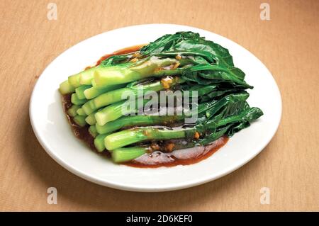 Chinese broccoli, kai lan with oyster sauce Stock Photo