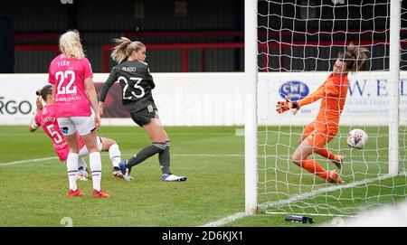 Manchester United's Alessia Russo (centre) scores her side's first goal of the game during the FA Women's Super League match at Victoria Road Stadium, London. Stock Photo