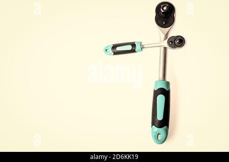 Ratchet tool. Steel made with no skid threaded handle you can hold firmly without slipping. Socket spanner wrenches white background. Knob for socket wrench nut ratchet close up. Ratchet wrench. Stock Photo