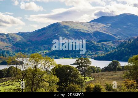 View to mountains across Ullswater in northern Lake District National Park in autumn. Dockray, Cumbria, England, UK, Britain Stock Photo