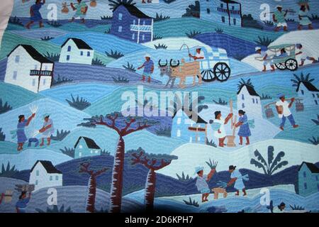 Rural life in Madagascar has been shown in exquisite detail on a stitched tapestry. Stock Photo