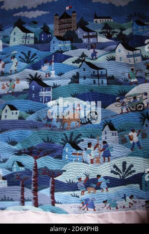 Rural life in Madagascar has been shown in exquisite detail on a stitched tapestry. Stock Photo