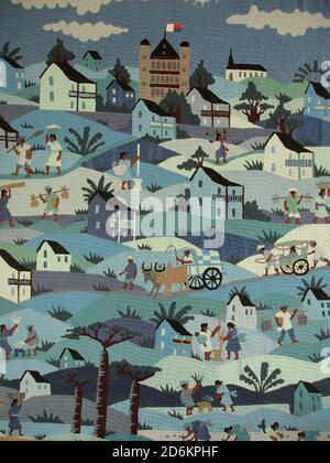 Rural life in Madagascar has been shown in exquisite detail on a stitched tapestry. Stock Photo