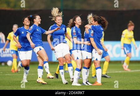 Everton's Izzy Christiansen (2nd right) celebrates scoring his side's first goal of the game with her team-mates during the FA Women's Super League match at Walton Hall Park, Liverpool. Stock Photo