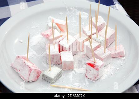 Turkish delight confectionary sweets displayed on a white plate Stock Photo