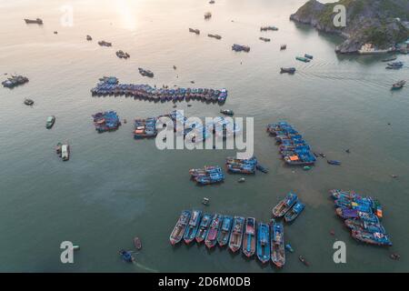 Fishing boats  in Cat Ba Island, Vietnam, Ha Long Bay descending dragon bay Asia Aerial Drone Photo View Stock Photo