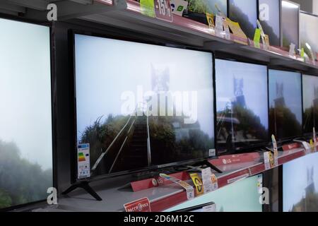 Tiraspol, Moldova - January 19, 2019: Wall of LCD Televisions at Store in Tiraspol, Moldova.