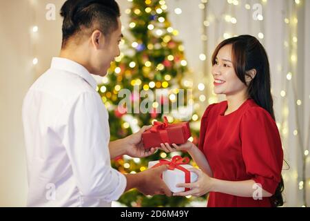 Exchanging Christmas presents Stock Photo