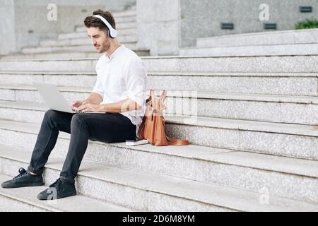 Coding young man Stock Photo
