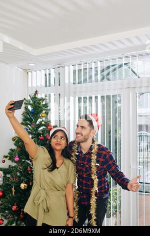 Colleagues taking selfie Stock Photo